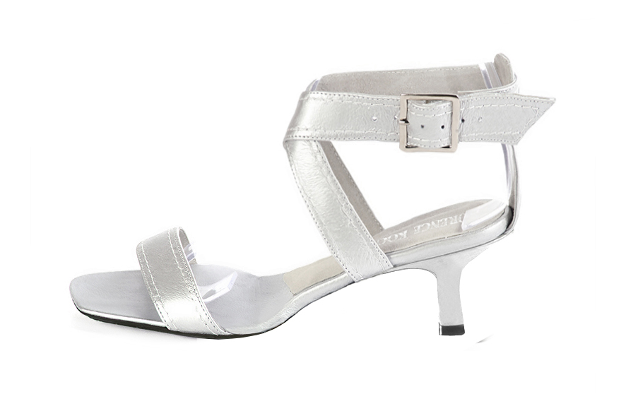 Silver elegant sandals with cross straps across the instep, fully open. Square toe. Medium spool heels. - Florence KOOIJMAN